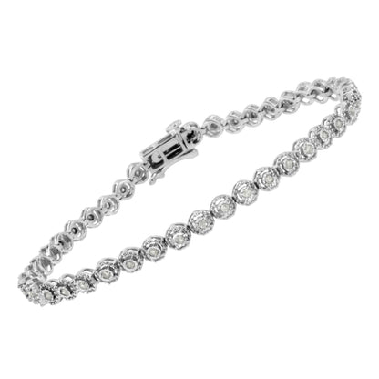 White metal bracelet with round white gemstones in a miracle setting, shown from an angled top view.
