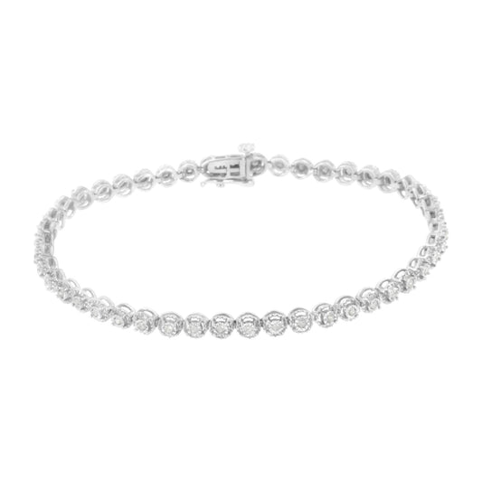 White metal bracelet with round white gemstones in miracle setting, shown from a top angle.