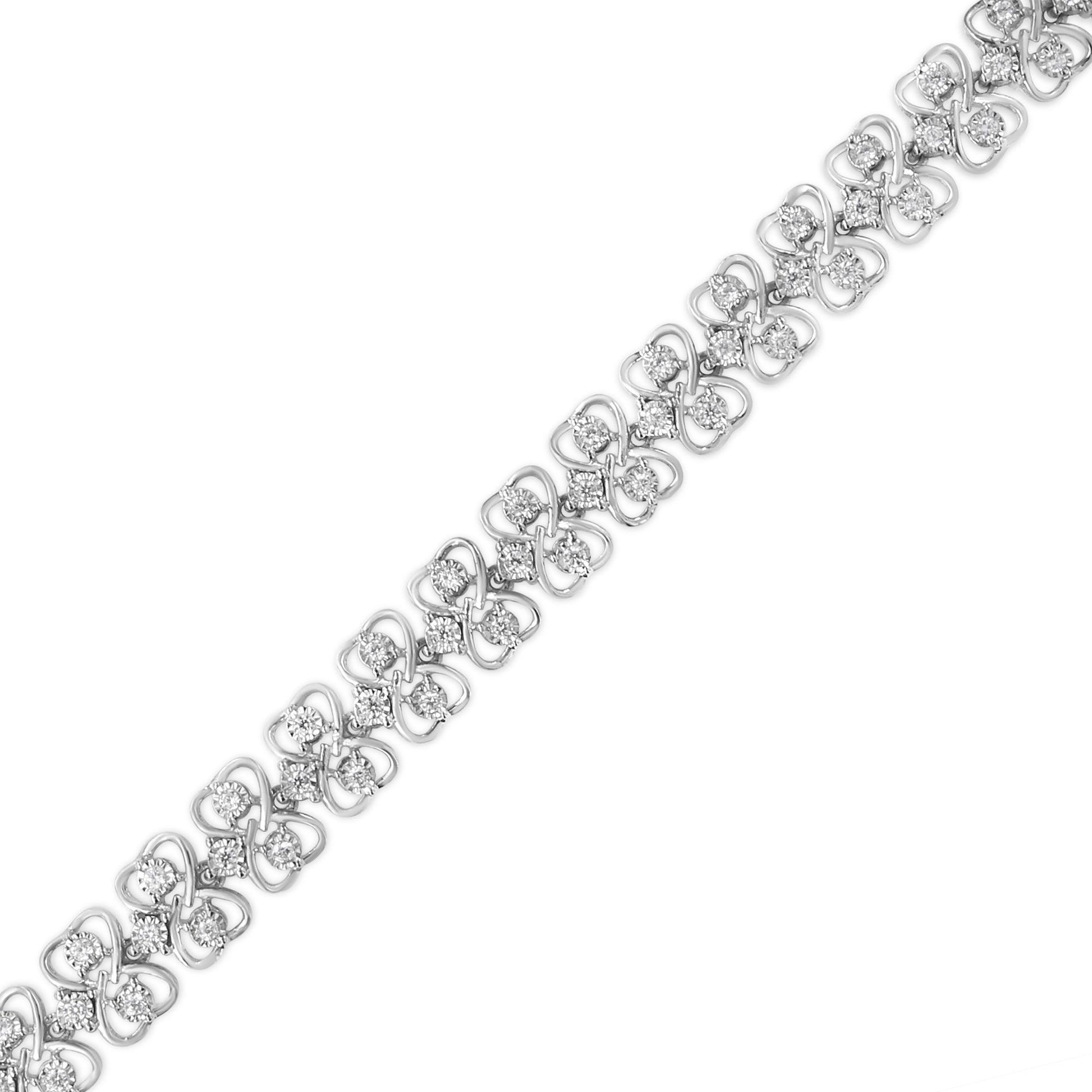 White metal bracelet with round white gemstones in miracle setting, shown from a top angle.