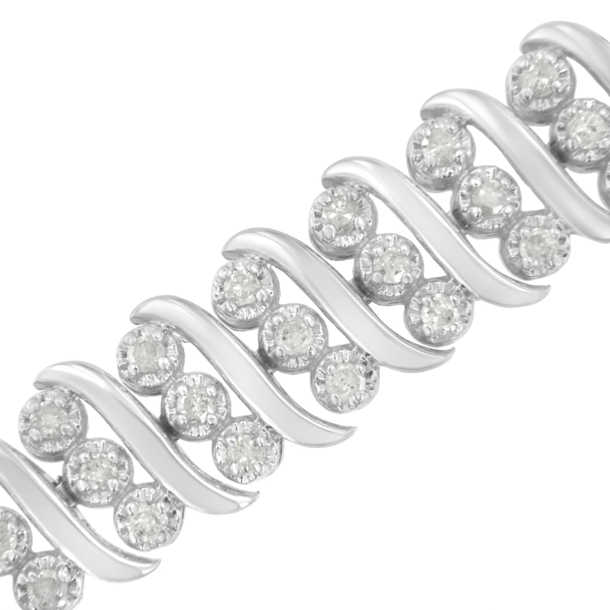 Close-up diagonal view of a white bracelet featuring round prong-set white gemstones in a repeating pattern with smooth curved metal accents.