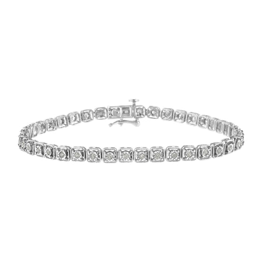 White metal bracelet with round white gemstones in a miracle setting, shown from a straight-on angle.