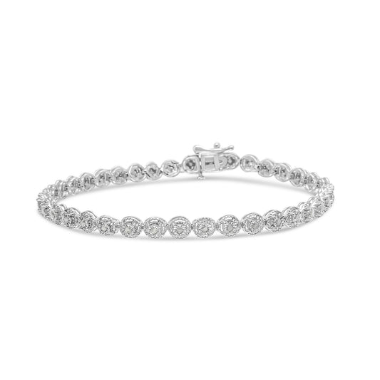 White metal bracelet with round white gemstones in a miracle setting, shown from a front angle.
