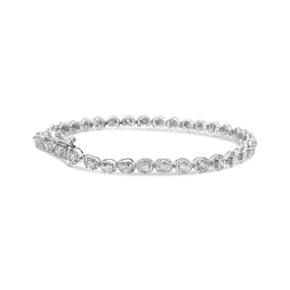 White metal bracelet with round white gemstones in miracle settings, shown at a slight angle on a white background.