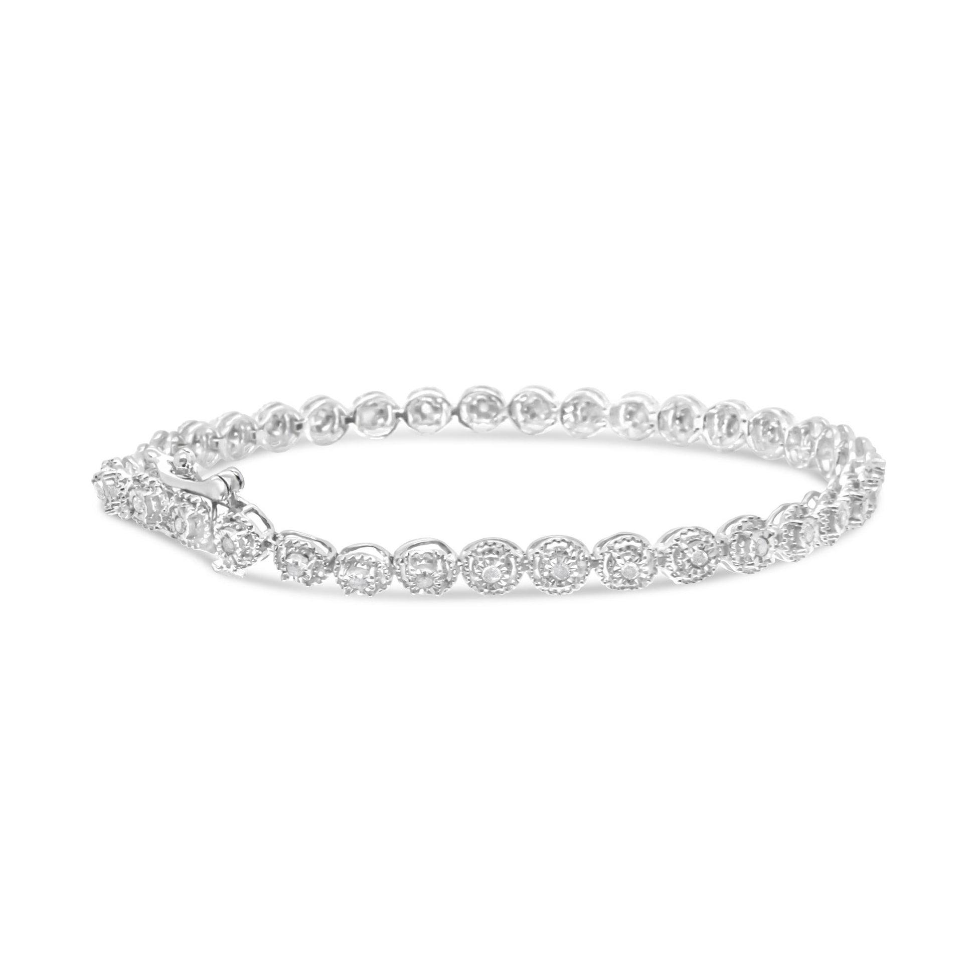 White metal bracelet with round white gemstones in miracle setting, shown in a close-up perspective from a slightly elevated side angle.