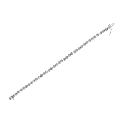 White metal bracelet with round white gemstones in a miracle setting, shown from an angled top view on a white background.