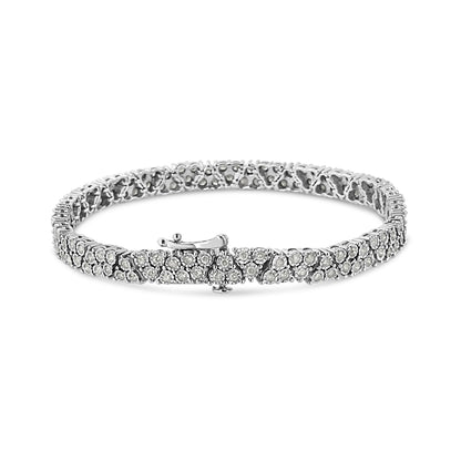 White metal bracelet with round white gemstones in a miracle setting, shown from an angled front view.