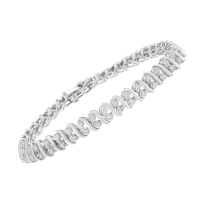 White metal bracelet with round white gemstones in pave setting, shown at an angled top view.