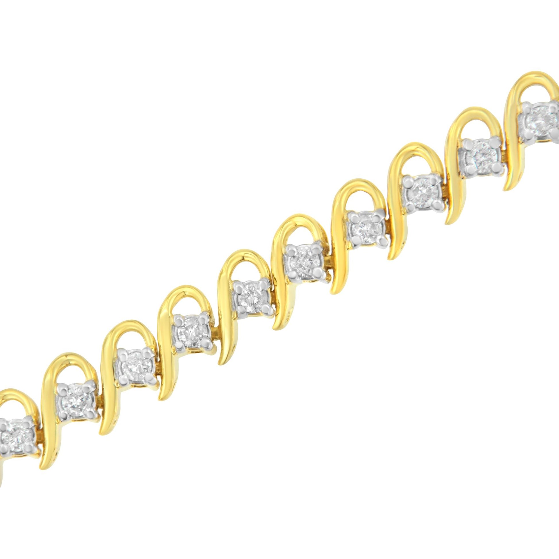 Diagonal close-up of a yellow metal bracelet featuring alternating loops and prong-set round white gemstones.