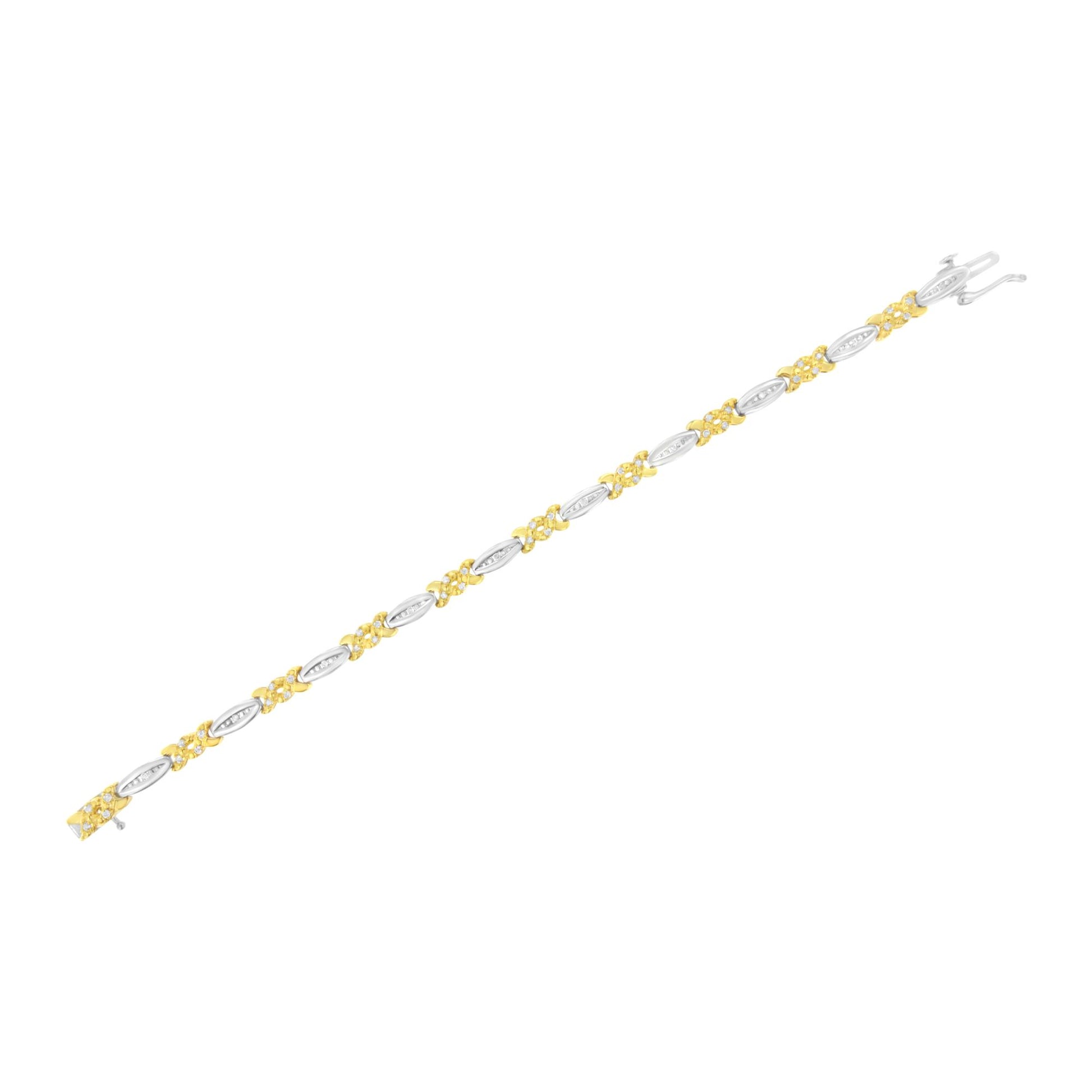 Bracelet with alternating yellow and white metal links, each white metal link set with small white gemstones, shown from a top-down angle.