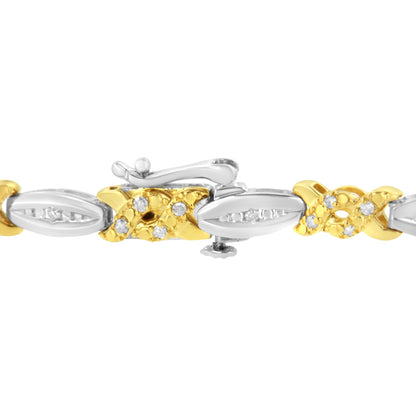 Close-up front angle of a yellow and white metal bracelet with round white gemstones in a channel setting.