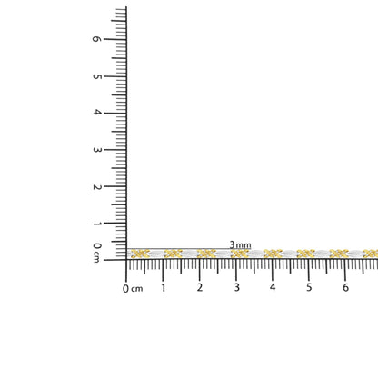 Bracelet with alternating yellow and white metal links accented with round white gemstones in channel setting, shown close-up on a ruler for size reference.