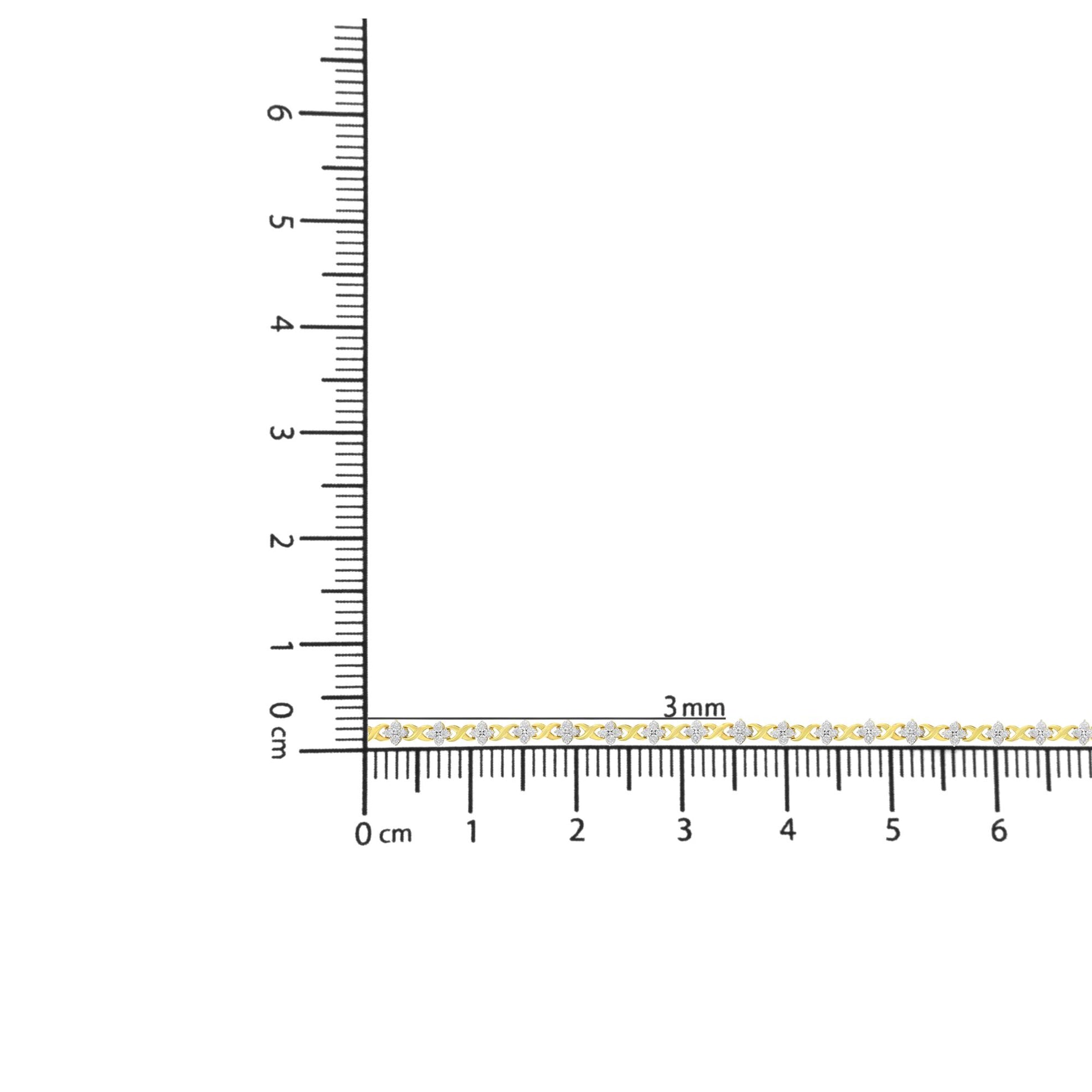 Yellow bracelet with round white gemstones in miracle setting, displayed flat on ruler for size reference, top-down view.