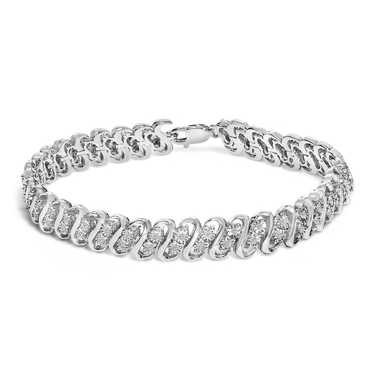 White metal bracelet with linked curved segments set with round white gemstones in a miracle setting, shown from a front angled view.