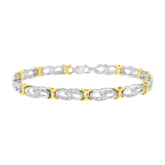 Front angle view of a two-tone bracelet with alternating yellow and white metal linked sections, featuring white round gemstones in a channel setting along the white metal links.