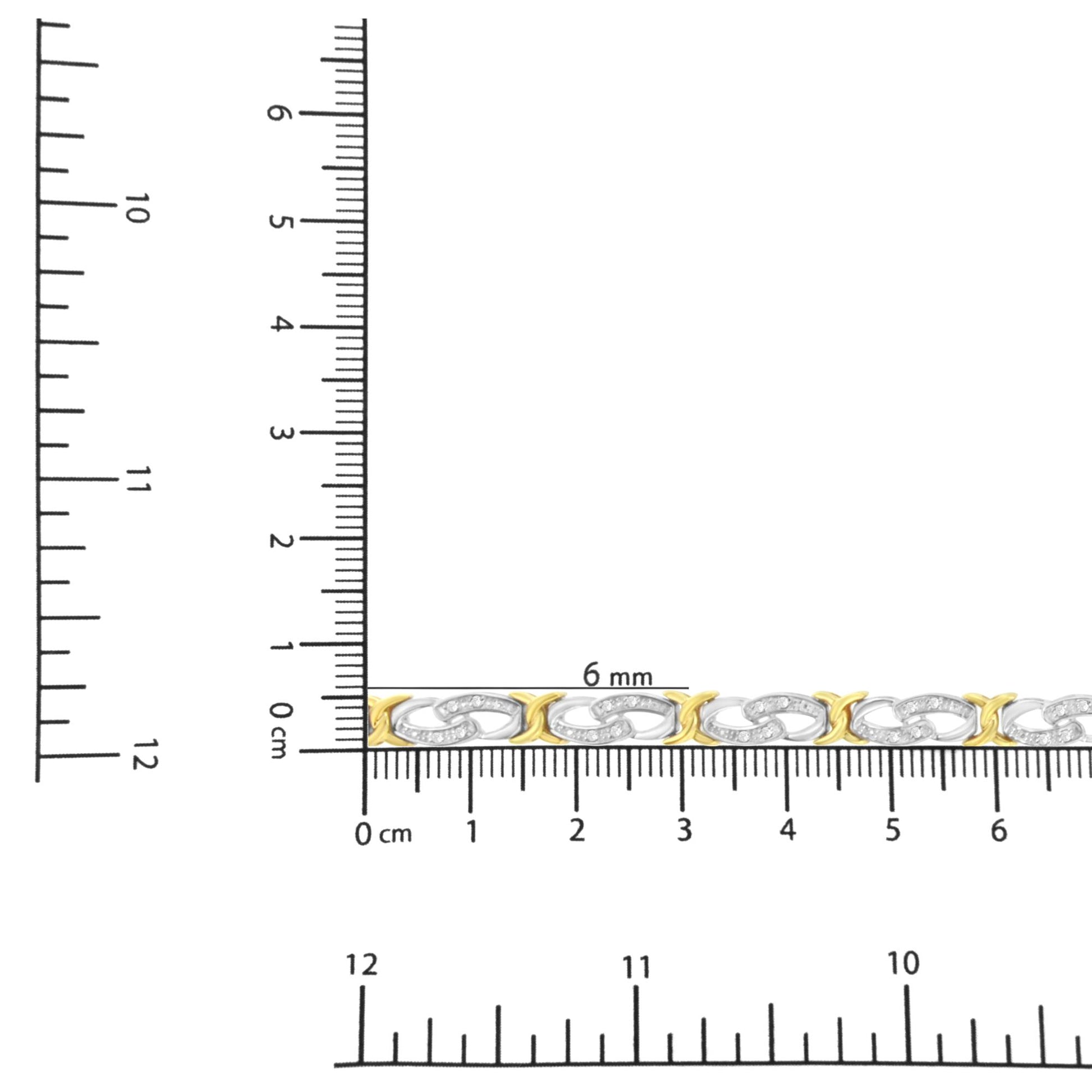 Bracelet with alternating yellow and white metal links, white round gemstones in channel setting on white links, shown in close-up on ruler for size reference, side angle.