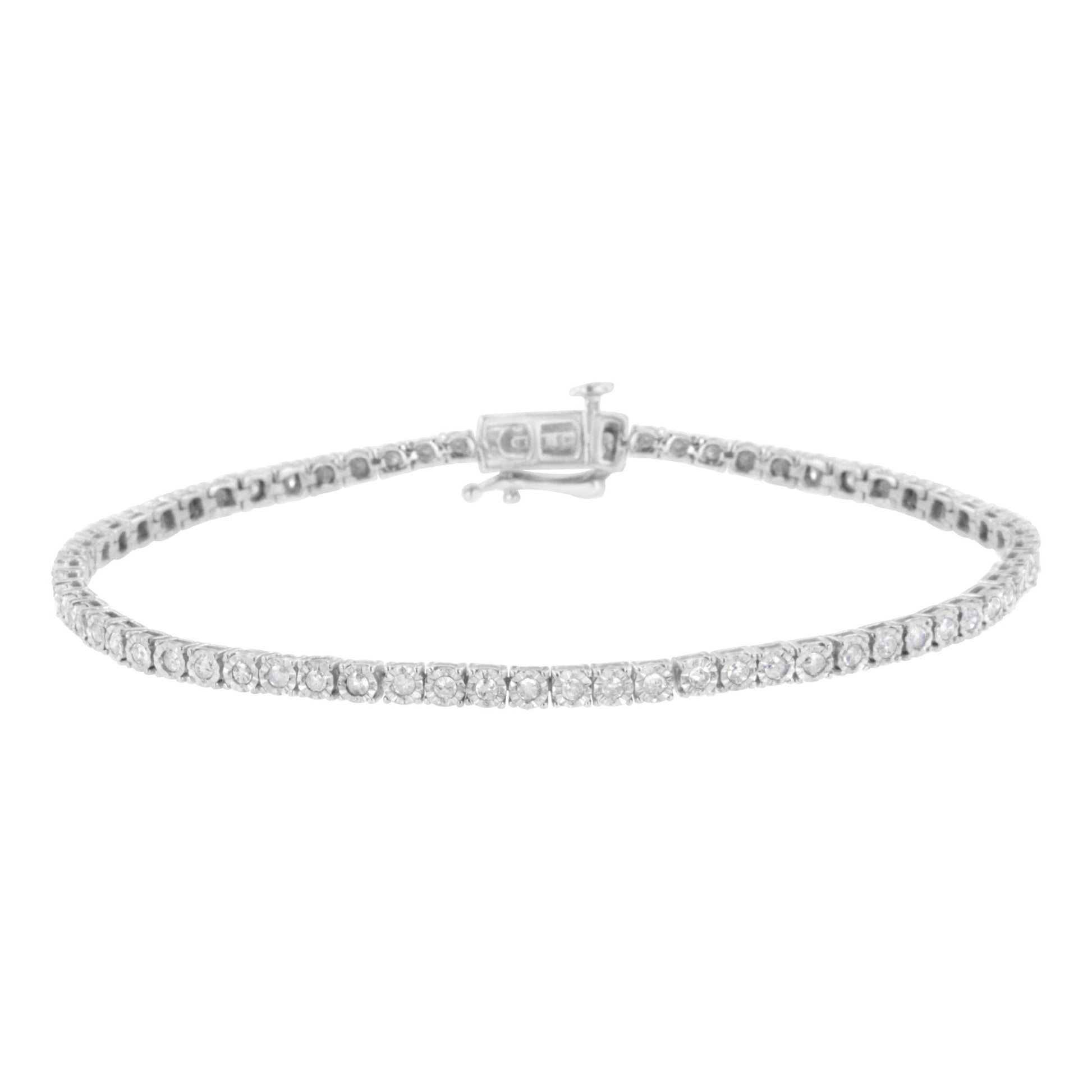 White metal bracelet with round white gemstones in miracle setting, shown in a front-facing close-up angle.