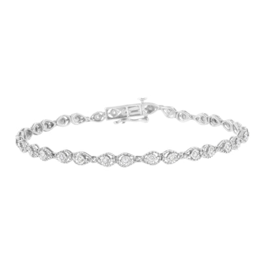 White metal bracelet with round white gemstones in a miracle setting, shown from a front angle.