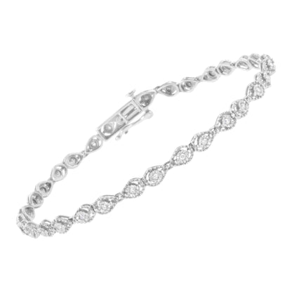 White metal bracelet with round white gemstones in a miracle setting, shown from a slight angled top view.