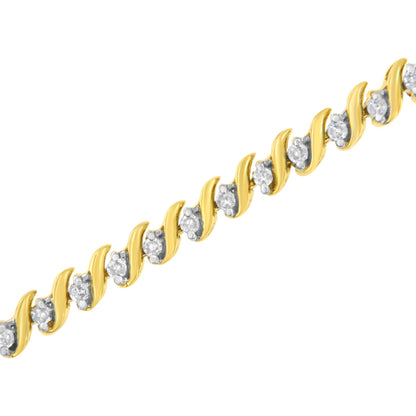 Diagonal close-up of a yellow bracelet featuring round white gemstones set in a prong setting.