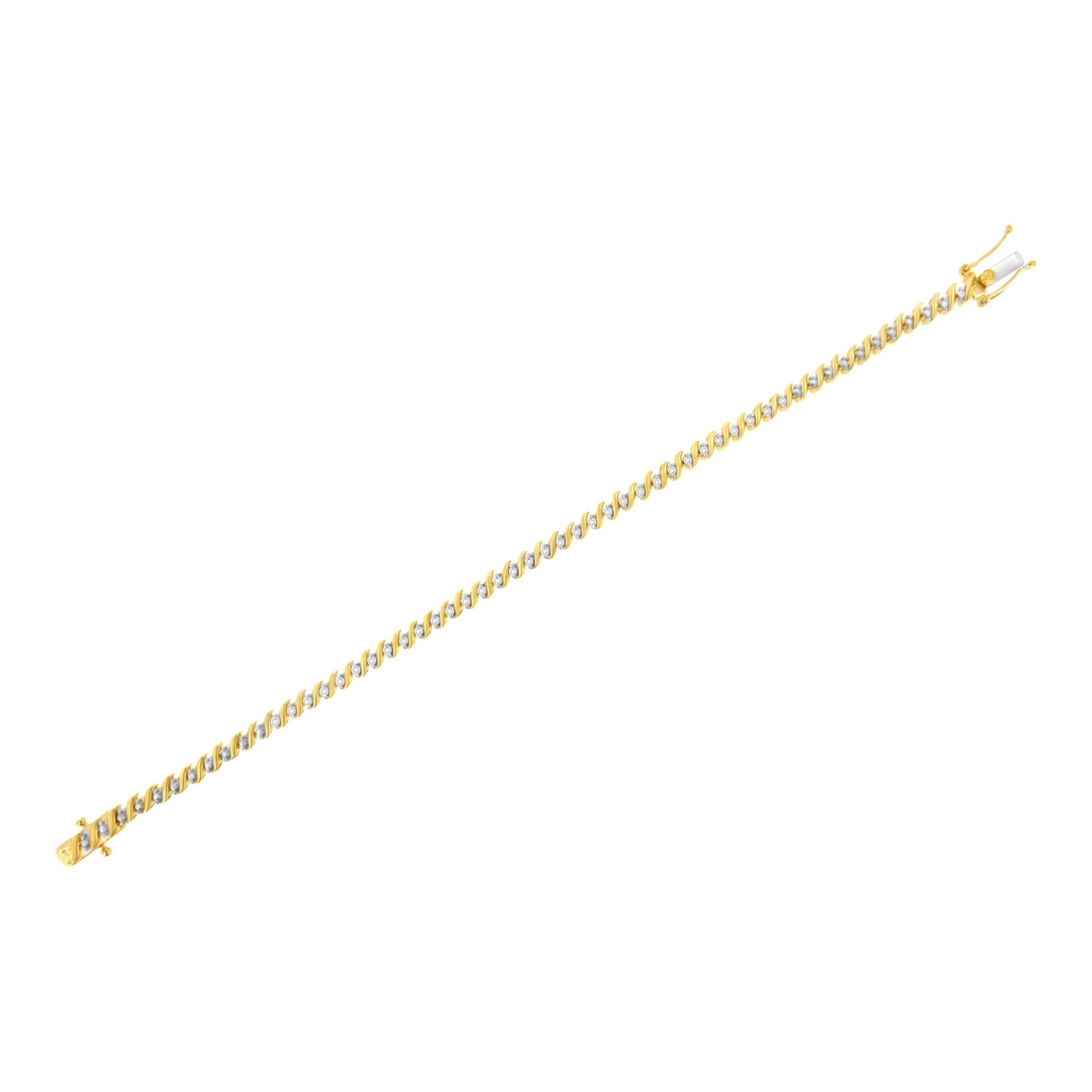Yellow metal bracelet with white round gemstones in 2-prong settings, shown from a top diagonal angle.