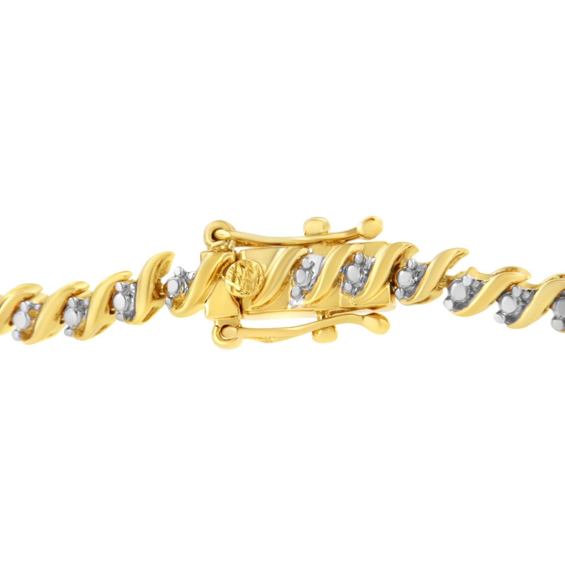 Close-up angled view of a yellow bracelet with twisted links, each set with small white round gemstones in 2-prong settings, showing the clasp.