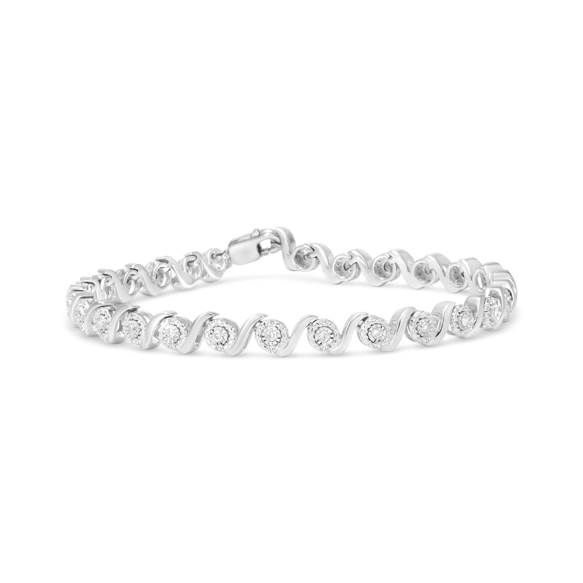 White metal bracelet with alternating round white gemstones in miracle and pave settings, shown from a front angle on a white background.