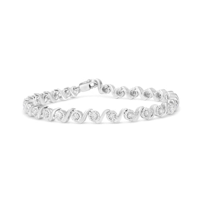 White metal bracelet with alternating round white gemstones in miracle and pave settings, shown from a front angle on a white background.