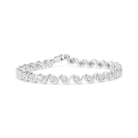 White metal bracelet with alternating round white gemstones in miracle and pave settings, shown from a front angle on a white background.