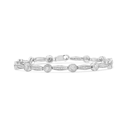 White metal bracelet with round white gemstones in miracle and pave settings, shown from a front angle.