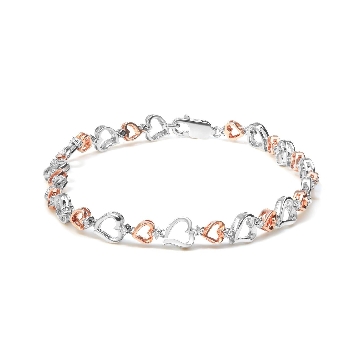 Bracelet with alternating white and rose heart-shaped links connected by small white gemstones, shown in a flat lay angled slightly from above.
