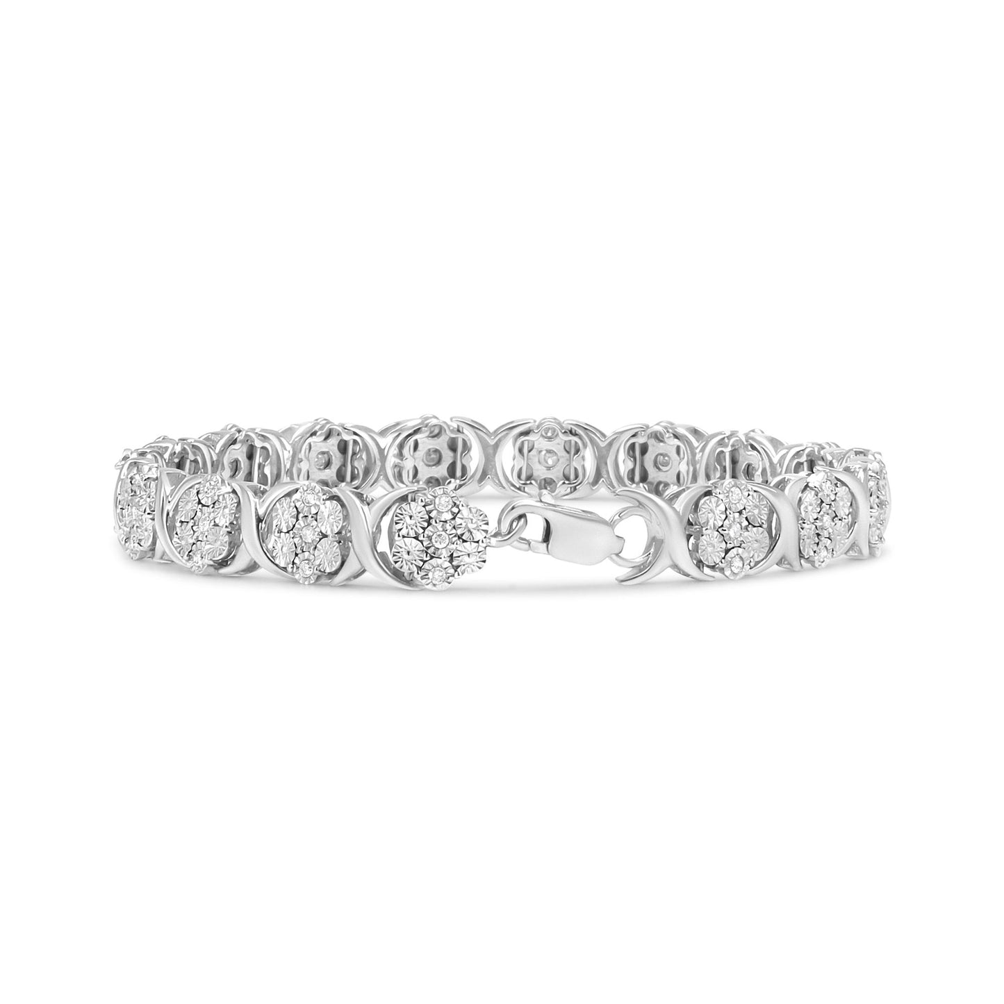 White metal bracelet with round white gemstones in miracle settings, shot from the front at a slight angle.