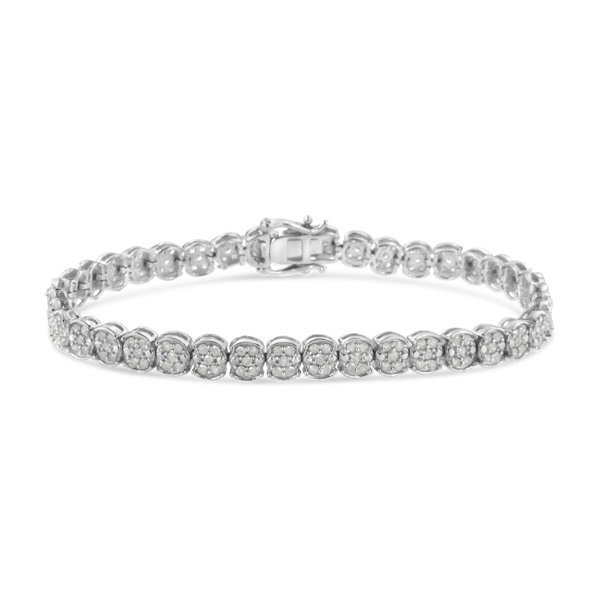 White metal bracelet with two rows of small round white gemstones in prong settings, shown from a front angled view.