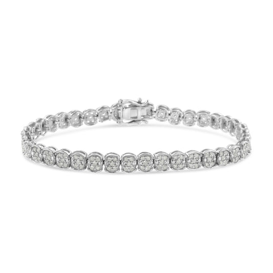 White metal bracelet with two rows of small round white gemstones in prong settings, shown from a front angled view.