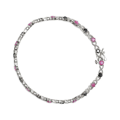 White metal bracelet with alternating pink and black round gemstones in prong settings, shown from a top-down angle.