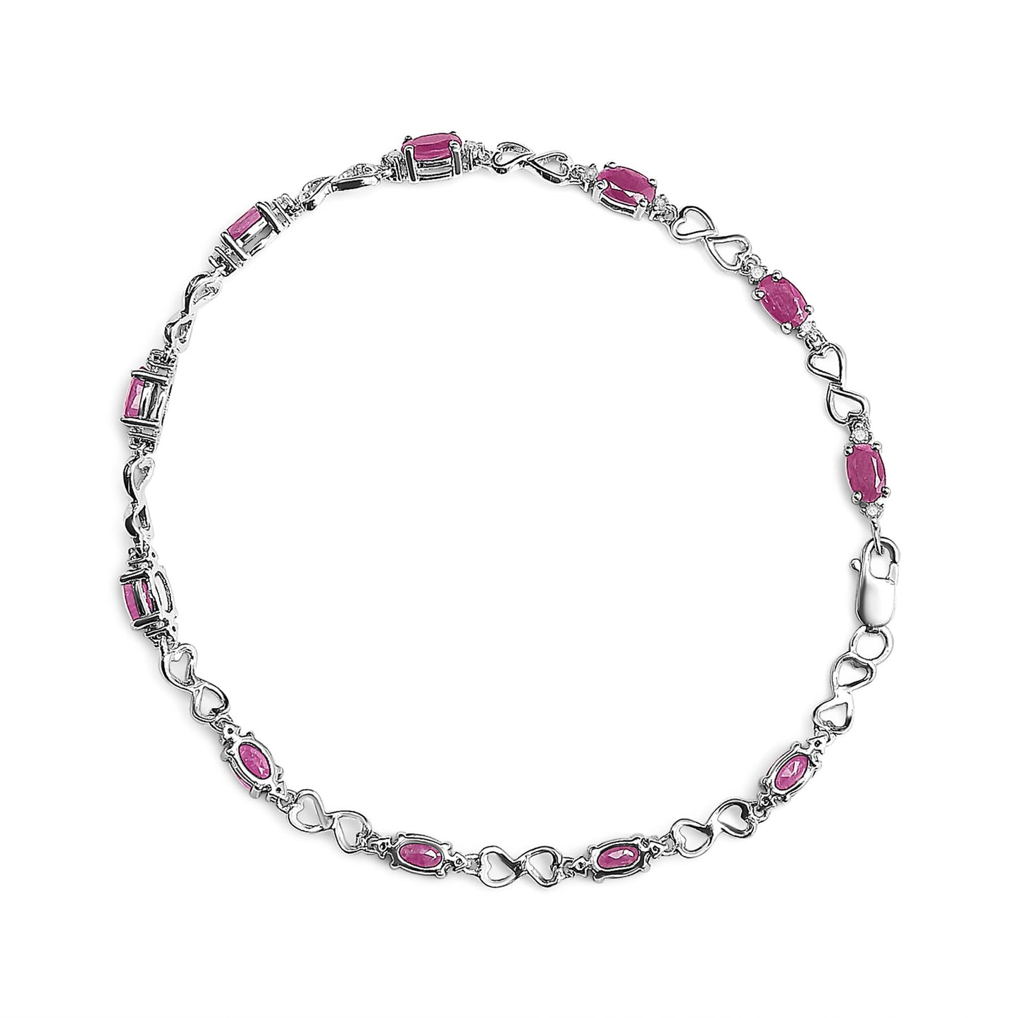 Top-down view of a white metal bracelet featuring alternating oval pink gemstones and heart-shaped links, interspersed with round white gemstones in prong settings.