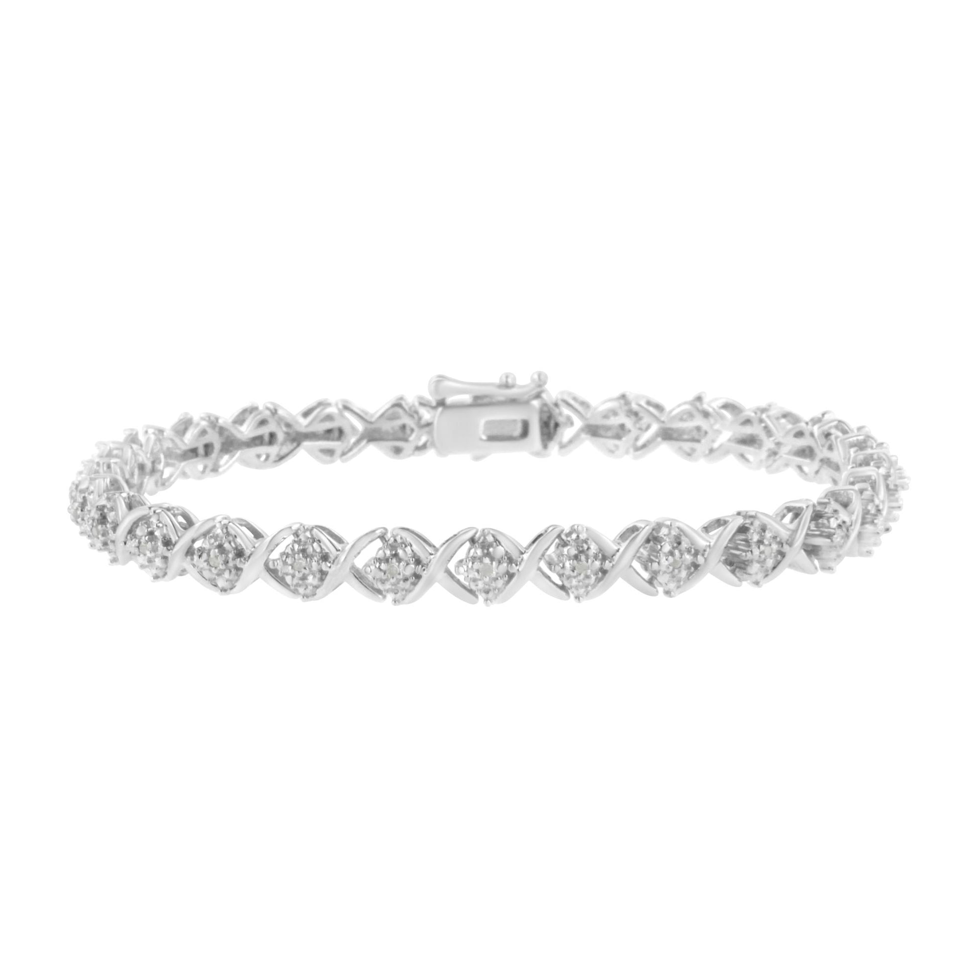 White metal bracelet with round white gemstones in a pave setting forming a twisted pattern, shown in a front-facing angle.