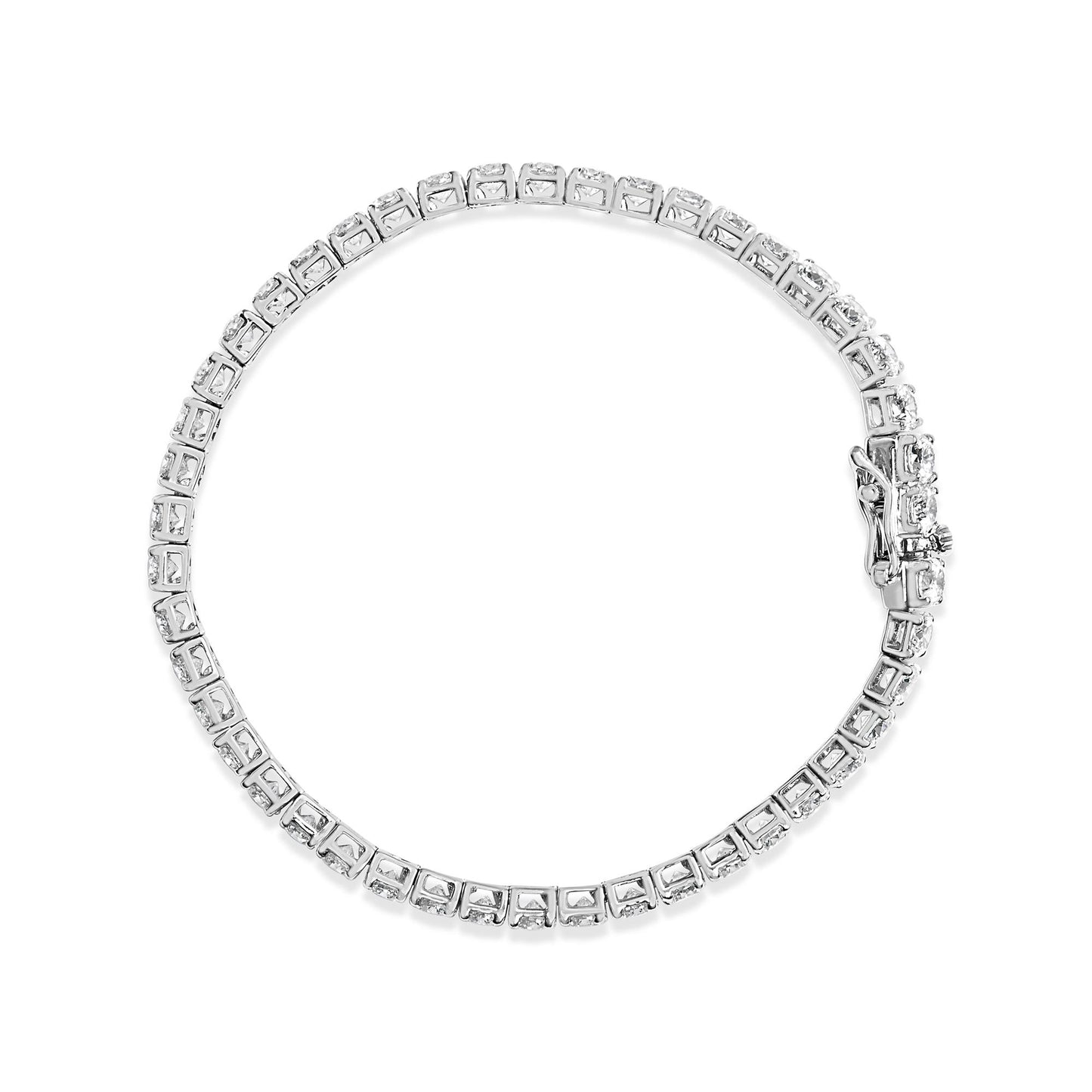 Top-down view of a white metal bracelet featuring round white gemstones in prong settings encircling the band, with a visible clasp.