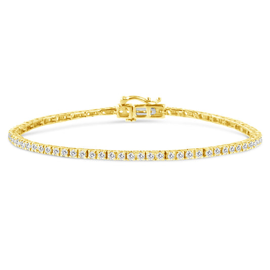 Yellow metal bracelet with round prong-set white gemstones, shown from a front angle on a white background.