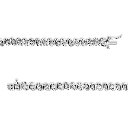 Close-up, top-down view of a white metal bracelet with round white gemstones set in a continuous, interlocking S-shaped pattern, showing the clasp open.