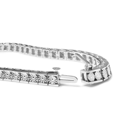 White metal bracelet with round white gemstones in miracle setting, shown open with clasp visible, photographed from side angle on white background.