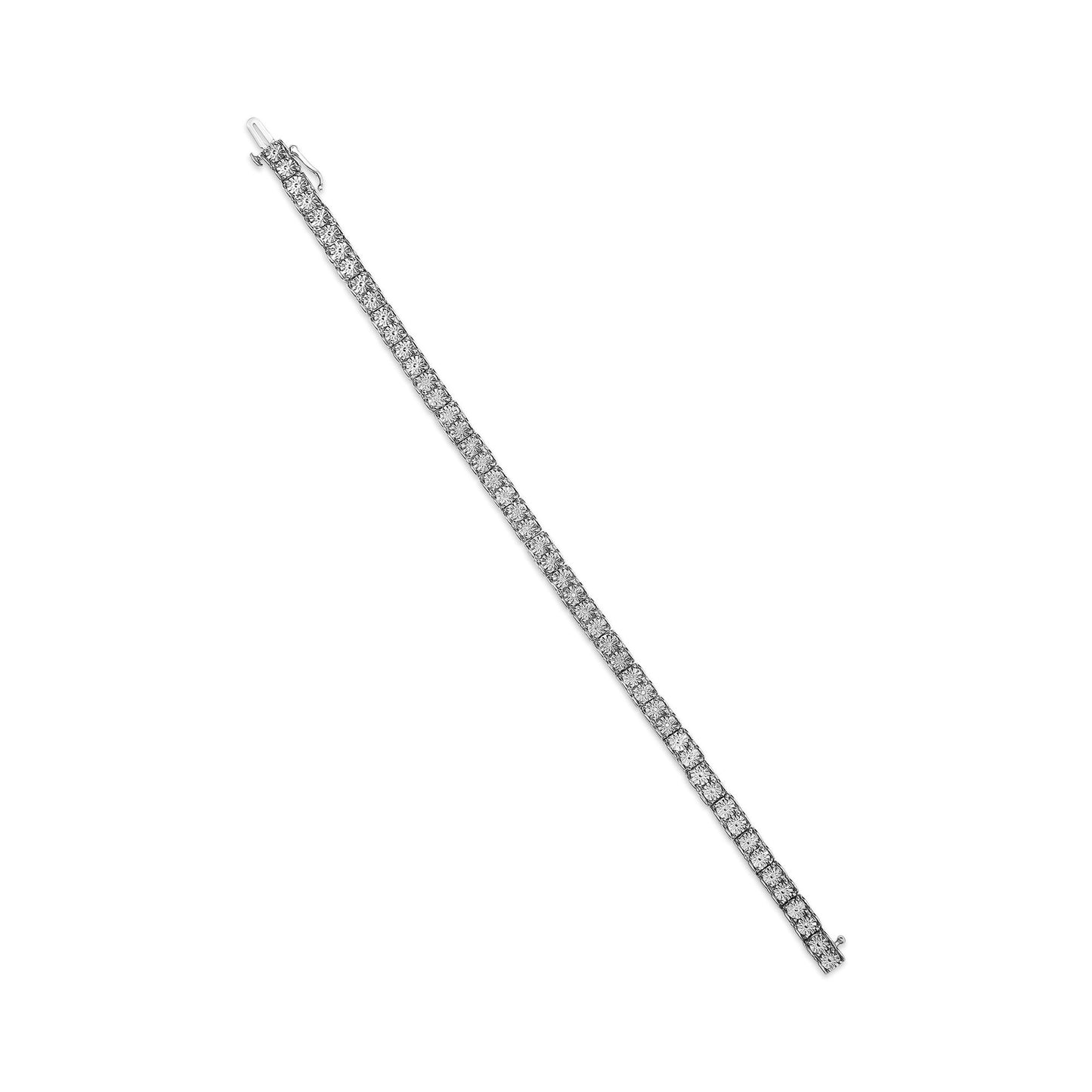 White metal bracelet with round white gemstones in miracle setting, shown flat from an angled top view.