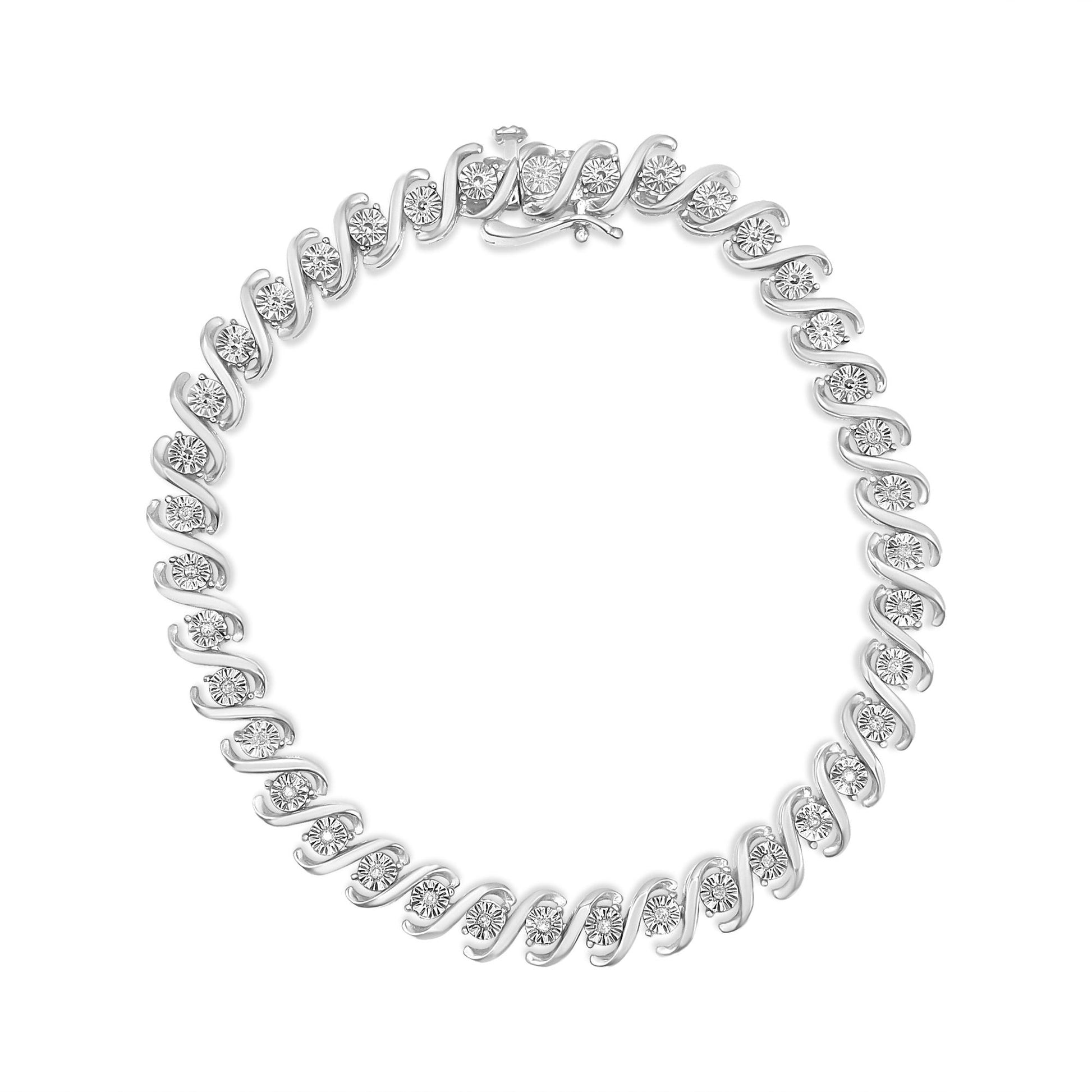 Top-down view of a white metal bracelet featuring a continuous pattern of round white gemstones set in a miracle setting.