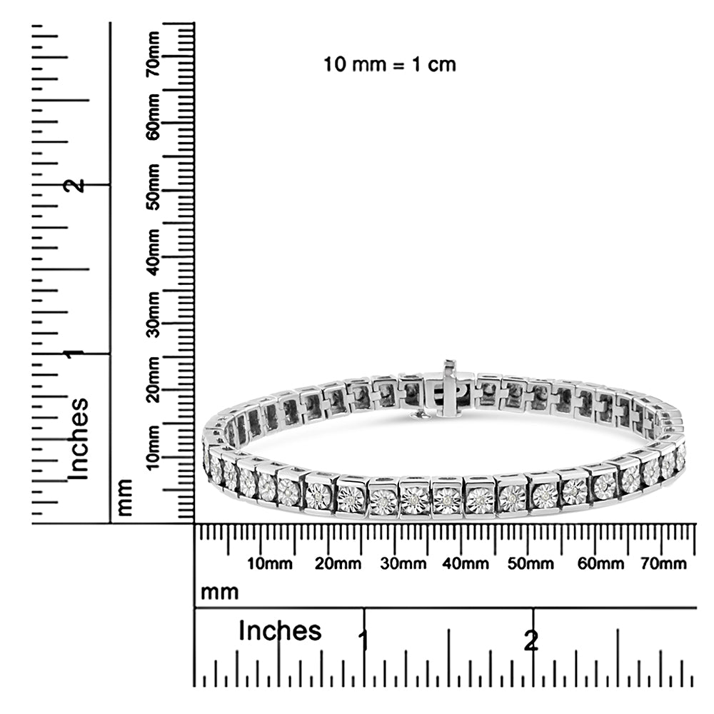 White metal bracelet with round white gemstones in a line, shown flat on a ruler and scale from an angled top view.