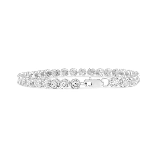 White metal bracelet with round white gemstones in miracle settings, shown from the front angle.