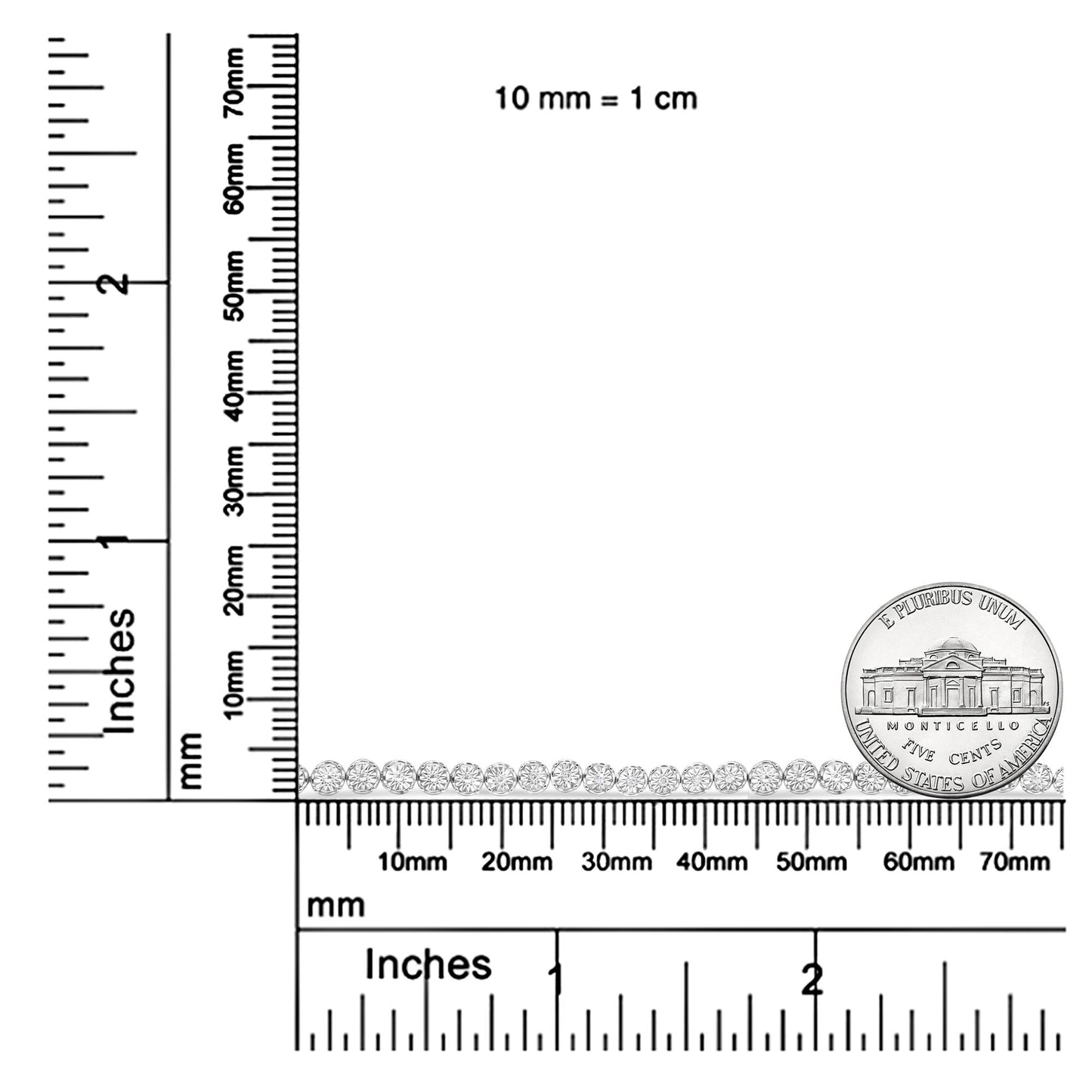 Top-down view of a white bracelet with round white gemstones in miracle setting, placed on rulers for size reference alongside a coin.