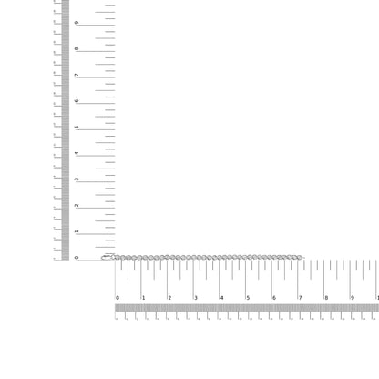 White metal bracelet with round white gemstones in a miracle setting, displayed flat on intersecting rulers for size reference, top-down angle.