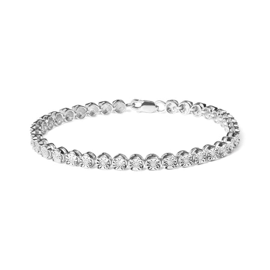 White metal bracelet with round white gemstones in a miracle setting, shown in a front angled view on a white background.