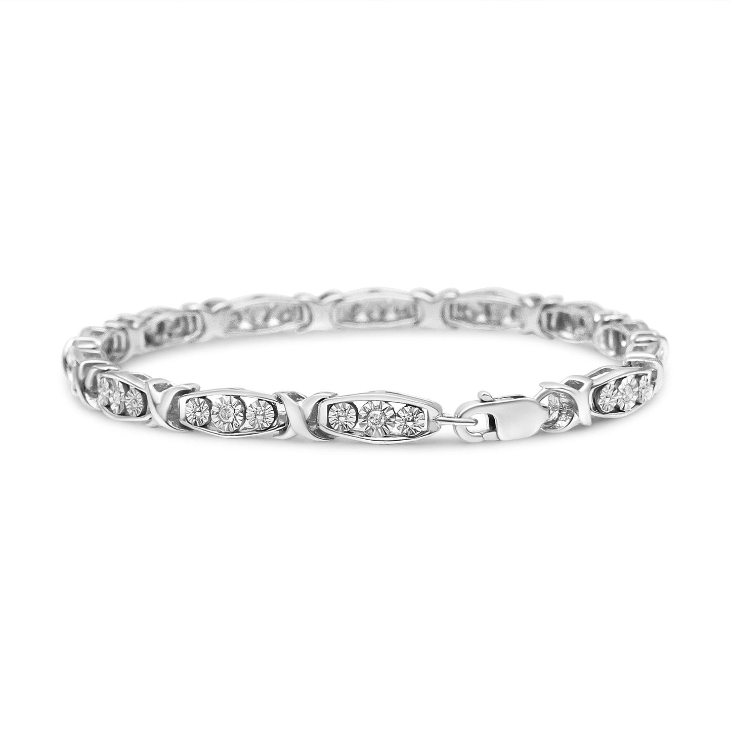 White metal bracelet with linked rounded rectangular segments set with white round gemstones in a miracle setting, shown from a front angle on a white background.