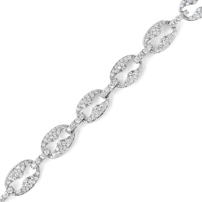 Close-up image of a white metal bracelet with alternating large oval links and smaller rectangular connectors, all adorned with round white gemstones in prong settings, displayed diagonally on a white background.