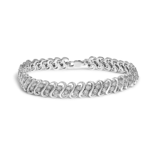White metal bracelet with loops set with round white gemstones in a miracle setting, shown at a slight angle on a white background.